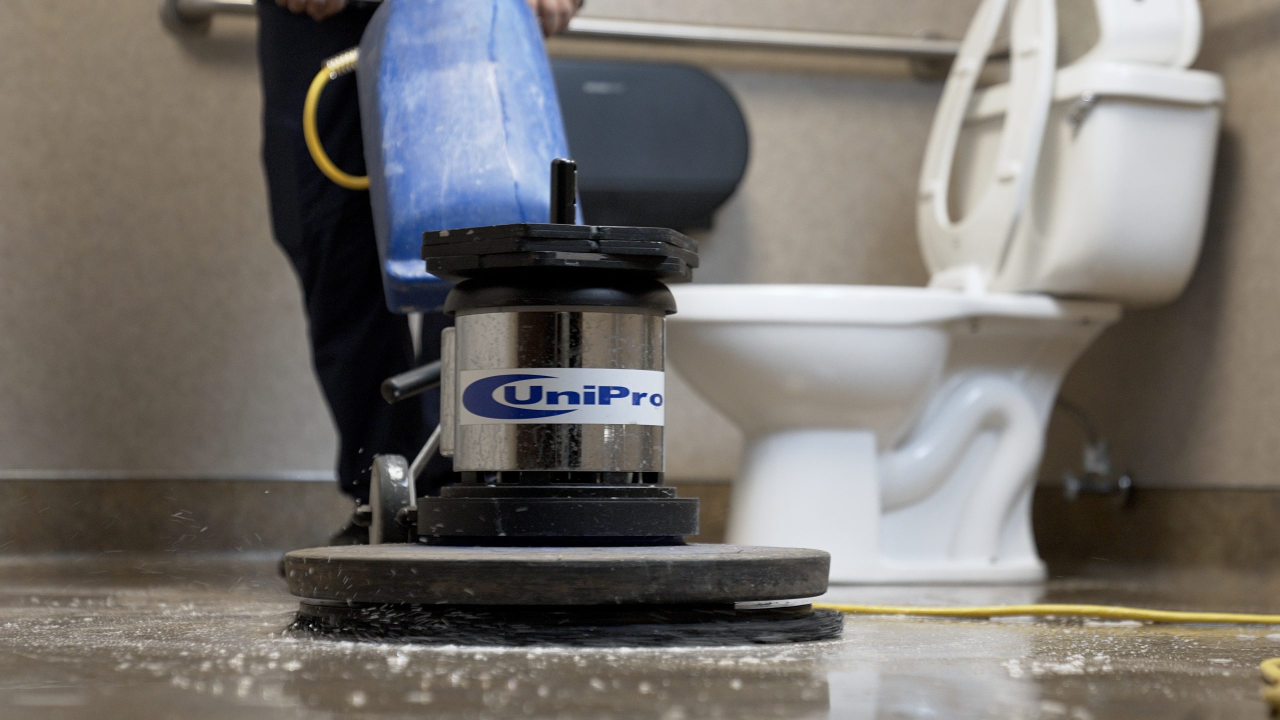 industrial celaning services - cleaning restroom floor